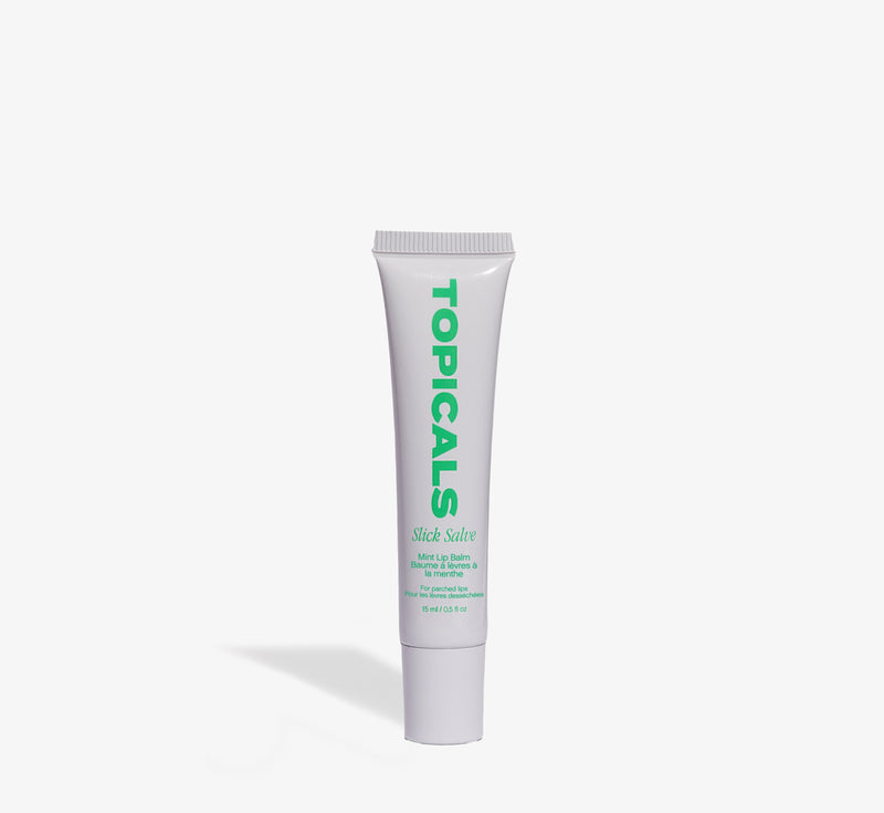 Mint lip balm from Topicals Slick Salve shown as a single white 15ml squeeze tube with green branding on a white background.